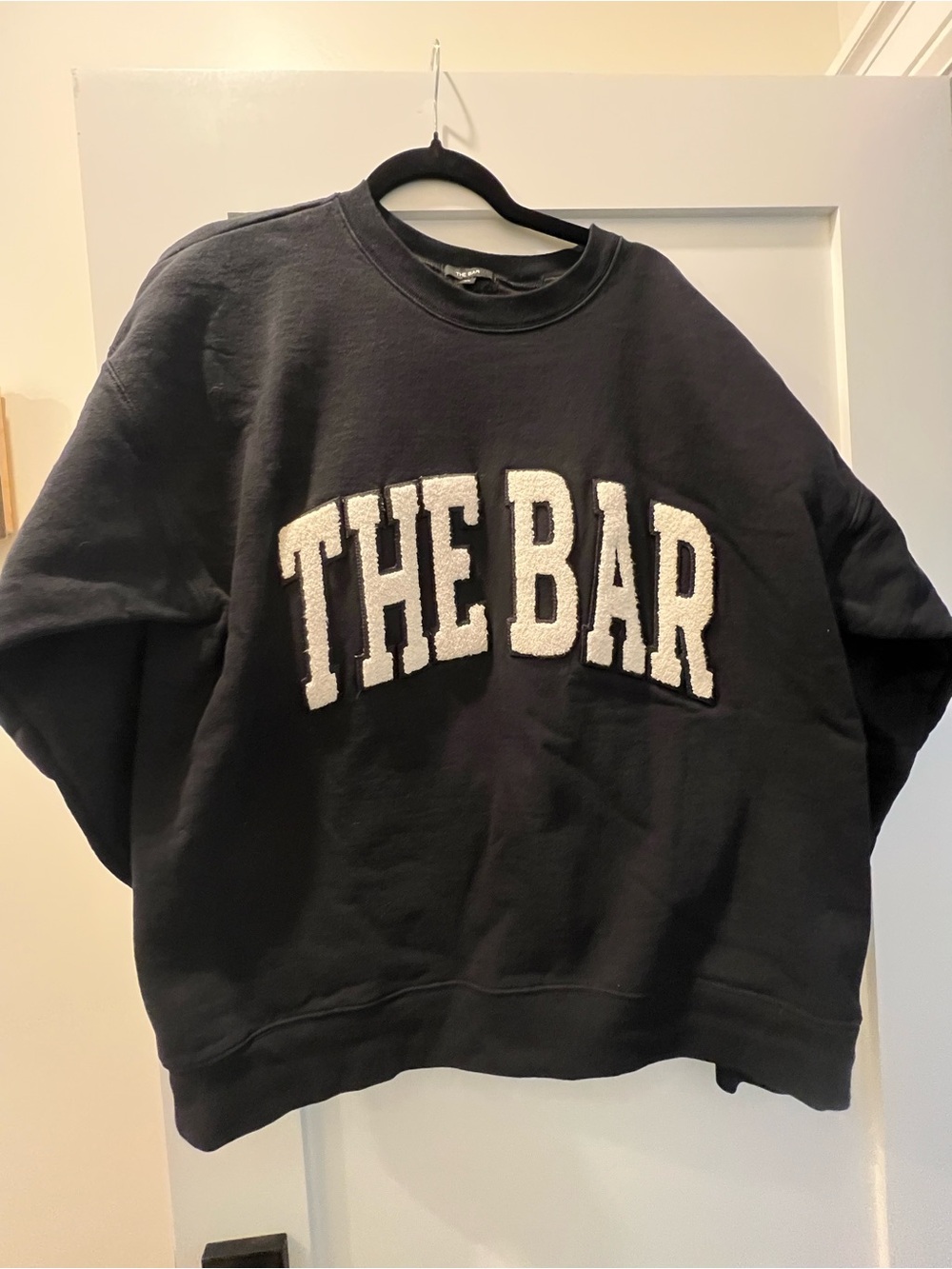 The Bar Black Crewneck Sweater with White Teddy Applique